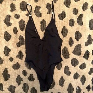 Naked Wolfe blue haven black one piece bathing suit